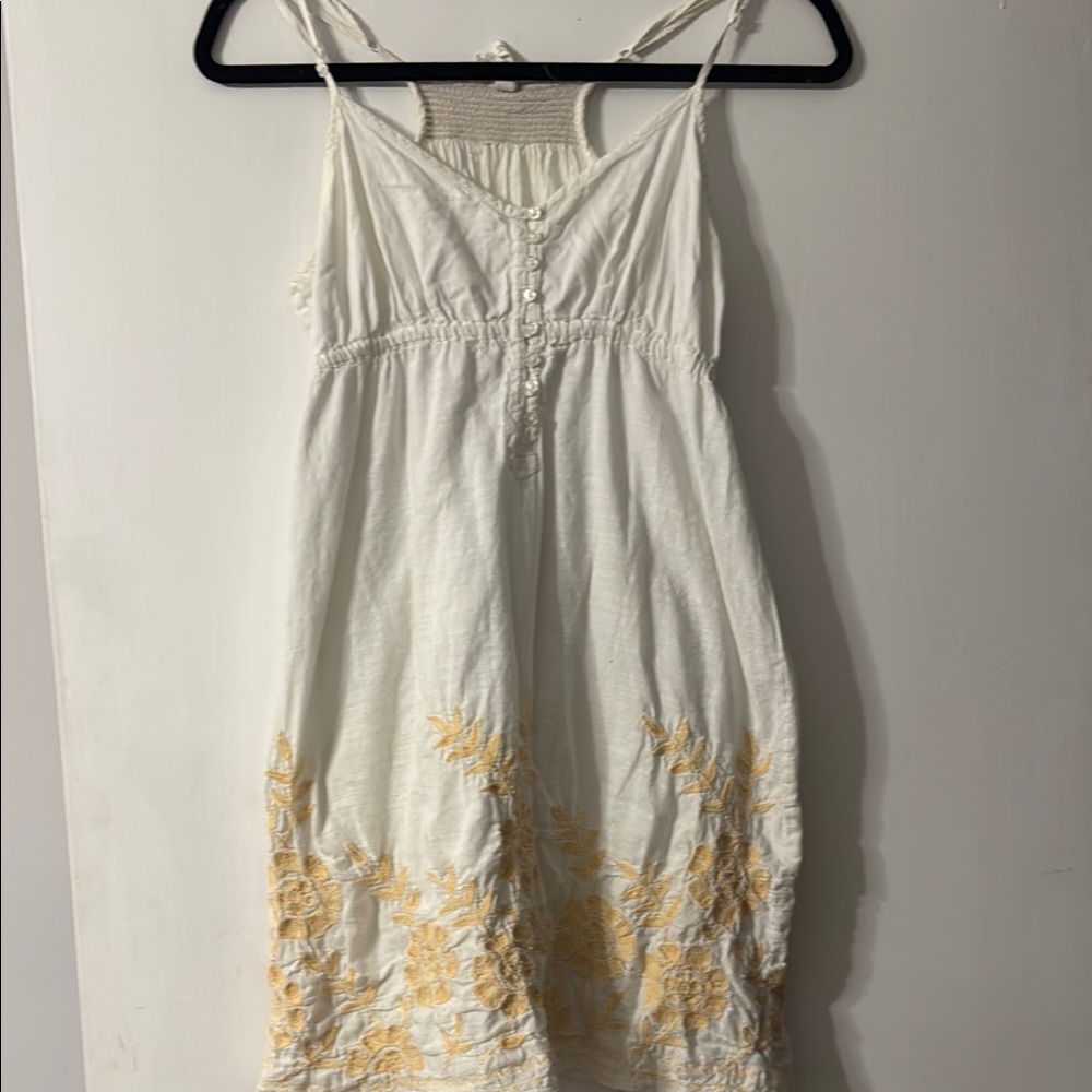 Elegant White and Gold Embroidered Dress